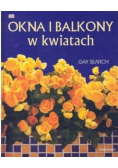 Okna i balkony w kwiatach