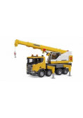 Scania Super 560R ciężarówka żółta z dźwigiem