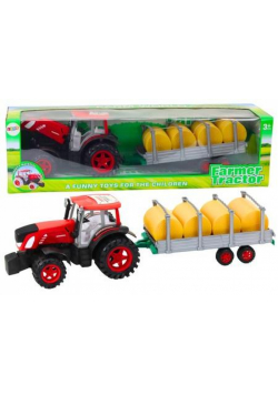 Traktor rolniczy z przyczepą i balami siana napęd
