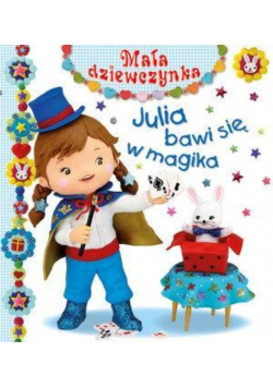 Mała dziewczynka Julia bawi się w magika