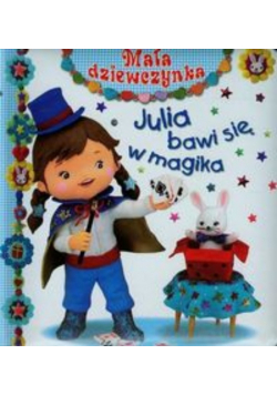 Mała dziewczynka Julia bawi się w magika