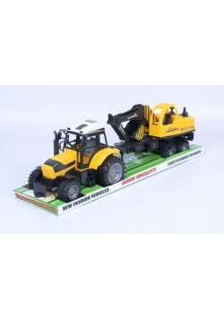 Traktor z maszyną budowlaną